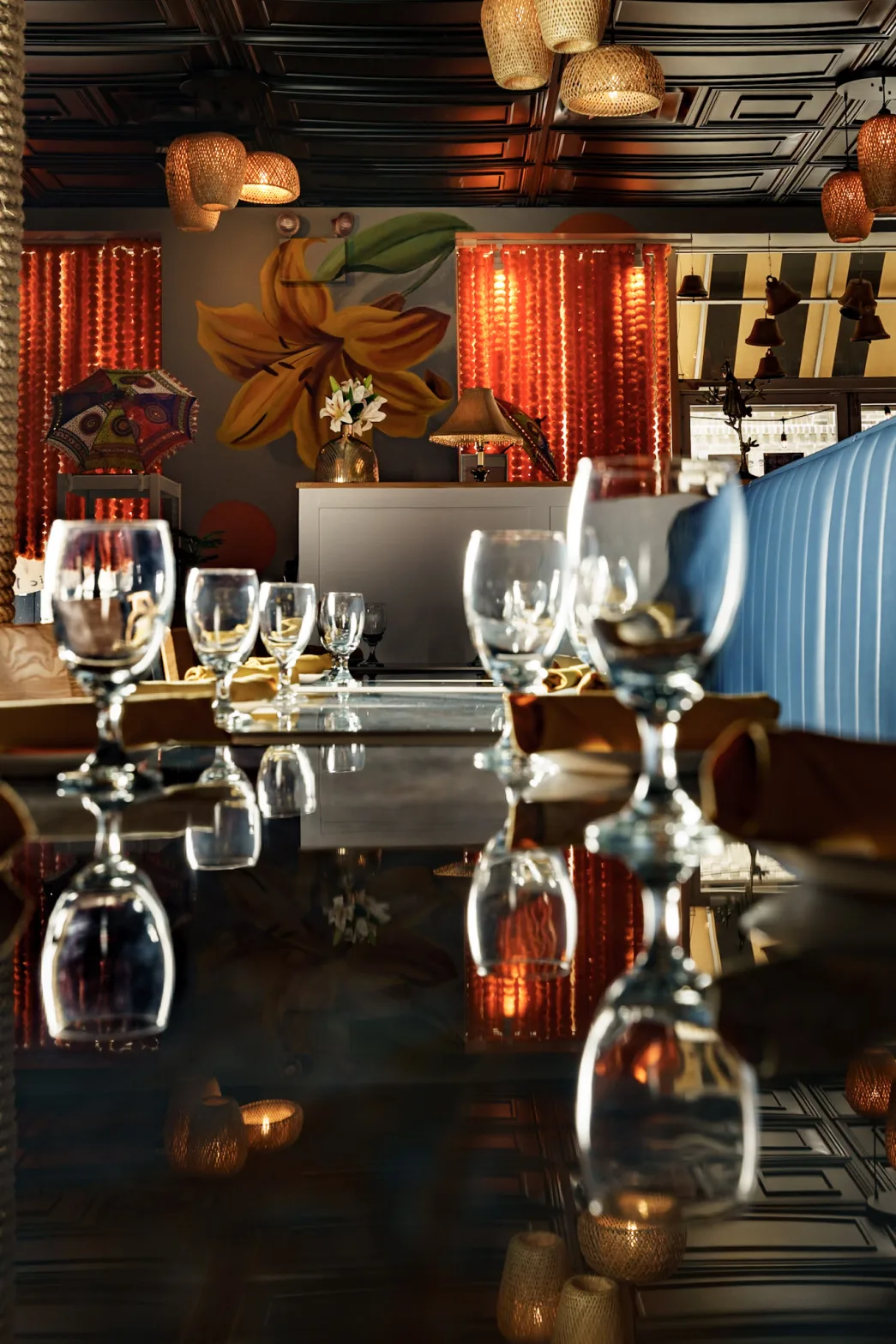 Lilly's dining room set with glassware under warm light